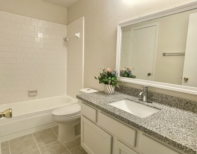 2711 Grants Lake Blvd Unit 203, Sugar Land, TX 77479 - bathroom featuring toilet, tile patterned floors, vanity, and shower / bath combination