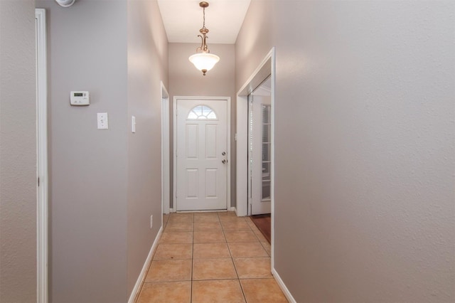 3532 Choctaw Dr, La Porte, TX 77571 - doorway featuring light tile patterned floors and baseboards