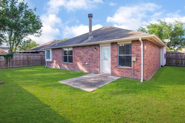 3532 Choctaw Dr, La Porte, TX 77571 - back of property featuring brick siding, roof with shingles, and a patio
