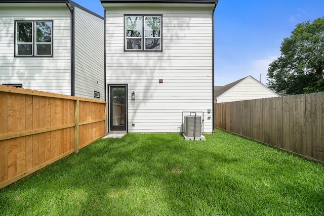 7117 Goforth St, Houston, TX 77021 - back of house featuring central AC unit