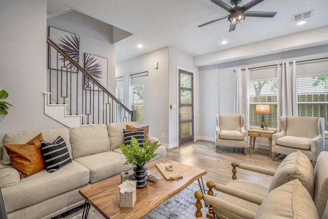3710 Noah St, Houston, TX 77021 - living room featuring wood finished floors, stairway, a ceiling fan, recessed lighting, and baseboards