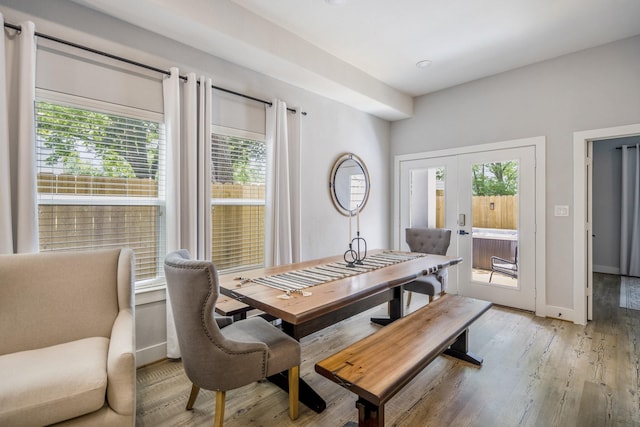 3710 Noah St, Houston, TX 77021 - dining space featuring plenty of natural light, french doors, light wood-style flooring, and baseboards