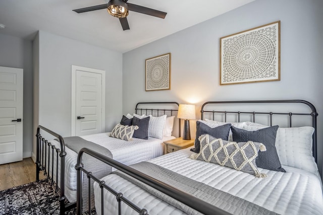 3710 Noah St, Houston, TX 77021 - bedroom featuring wood finished floors and a ceiling fan