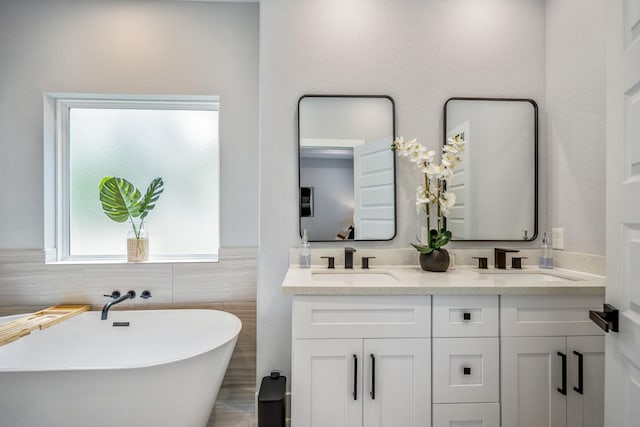 3710 Noah St, Houston, TX 77021 - full bathroom with a freestanding tub and double vanity