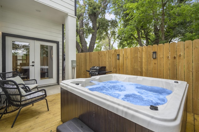 3710 Noah St, Houston, TX 77021 - deck featuring a hot tub, fence, area for grilling, and french doors