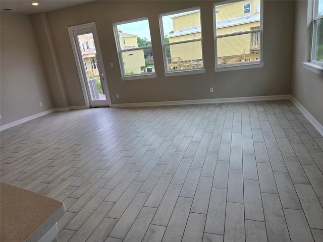 4029 Boardwalk Blvd, Seabrook, TX 77586 - spare room with light wood-style flooring and baseboards
