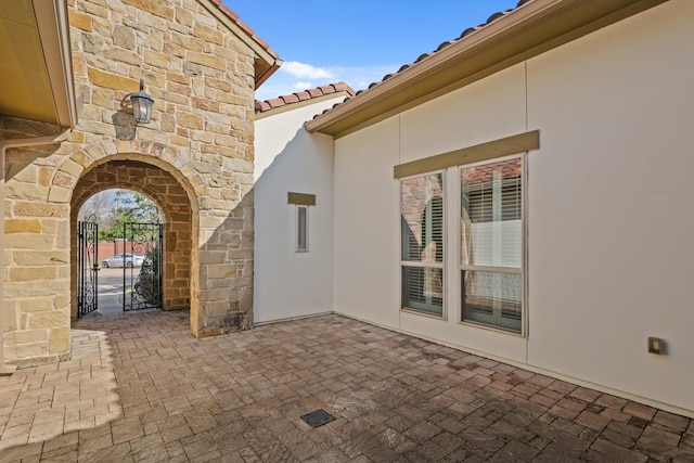 67 Quiet Vista Dr, Sugar Land, TX 77498 - view of patio with a gate