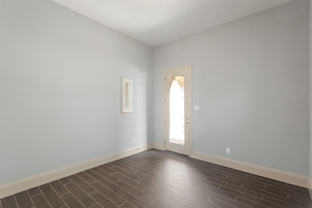 67 Quiet Vista Dr, Sugar Land, TX 77498 - foyer entrance featuring baseboards and dark wood-style flooring