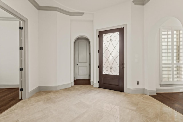 67 Quiet Vista Dr, Sugar Land, TX 77498 - tiled entrance foyer with arched walkways and baseboards