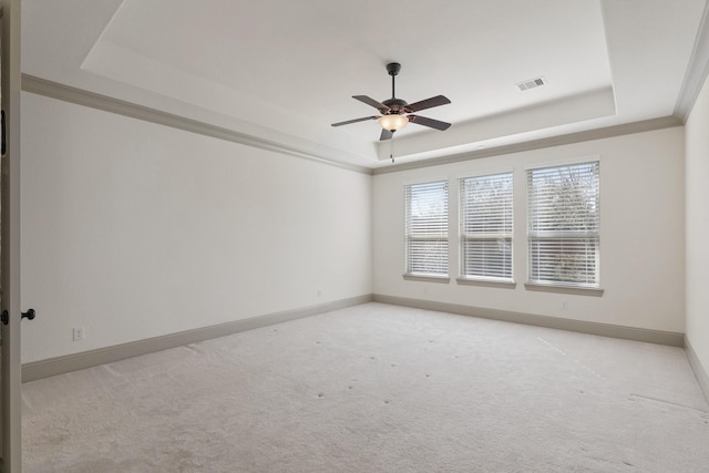 67 Quiet Vista Dr, Sugar Land, TX 77498 - unfurnished room featuring a raised ceiling, baseboards, and light carpet