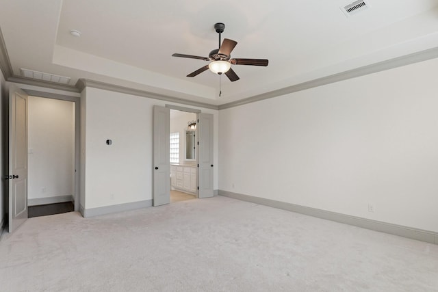 67 Quiet Vista Dr, Sugar Land, TX 77498 - unfurnished bedroom featuring light carpet, a raised ceiling, and baseboards