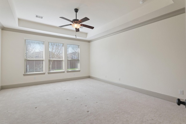 67 Quiet Vista Dr, Sugar Land, TX 77498 - unfurnished room with a raised ceiling, light colored carpet, and baseboards