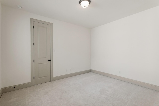 67 Quiet Vista Dr, Sugar Land, TX 77498 - spare room featuring light colored carpet, a smoke detector, and baseboards