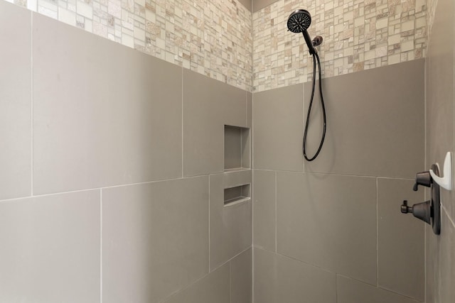 67 Quiet Vista Dr, Sugar Land, TX 77498 - bathroom view of tiled shower and tile walls