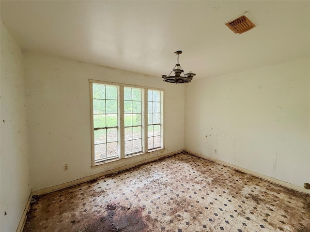 40736 Jozwiak Ln, Hempstead, TX 77445 - empty room featuring a chandelier and baseboards