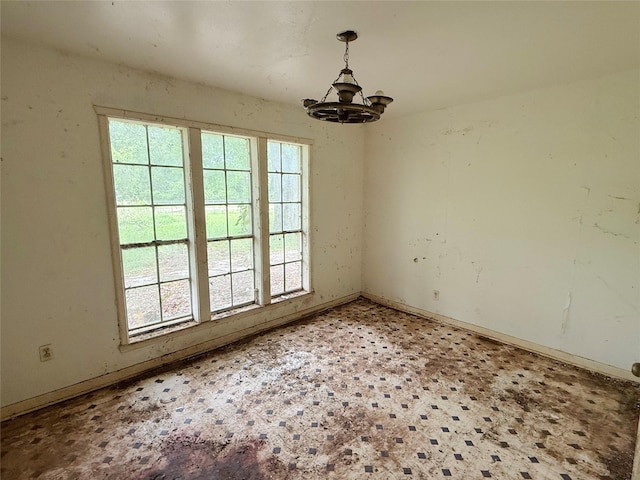 40736 Jozwiak Ln, Hempstead, TX 77445 - unfurnished room featuring a chandelier and baseboards