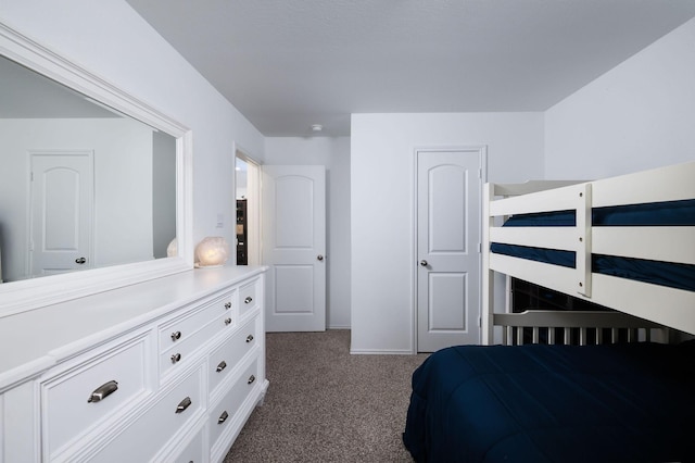 9905 Glenbrook Ln, Magnolia, TX 77354 - bedroom featuring dark carpet and baseboards
