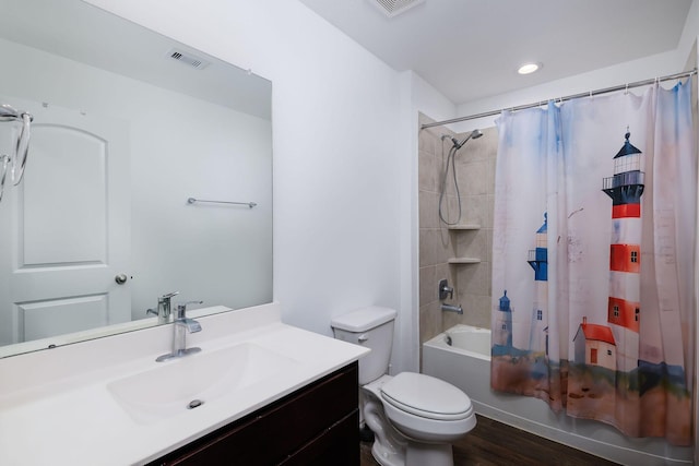 9905 Glenbrook Ln, Magnolia, TX 77354 - bathroom with shower / bath combo with shower curtain, wood finished floors, toilet, and vanity