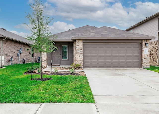9905 Glenbrook Ln, Magnolia, TX 77354 - ranch-style home featuring brick siding, a front lawn, concrete driveway, a garage, and roof with shingles