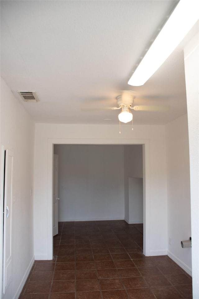 5311 Perry Ave, Galveston, TX 77551 - spare room with a ceiling fan and baseboards
