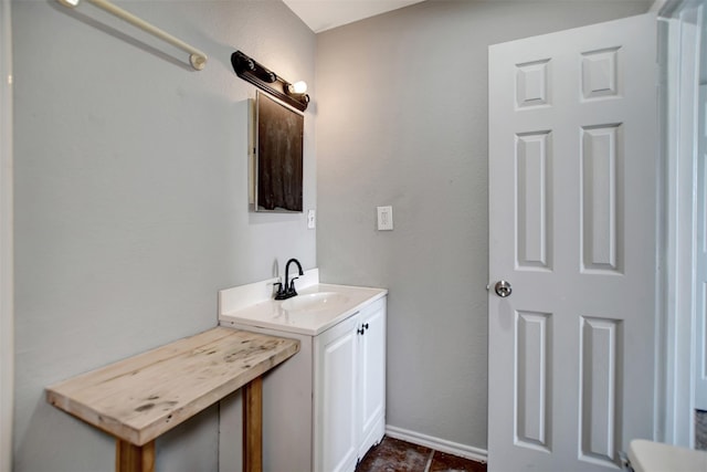 5311 Perry Ave, Galveston, TX 77551 - bathroom with vanity and baseboards