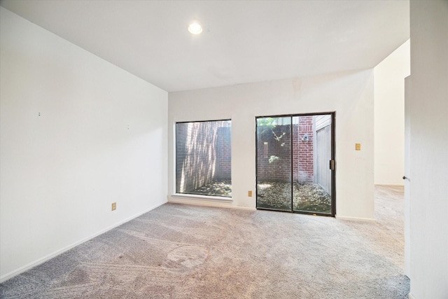 7447 Cambridge St Unit 75, Houston, TX 77054 - unfurnished room featuring carpet floors, baseboards, and recessed lighting