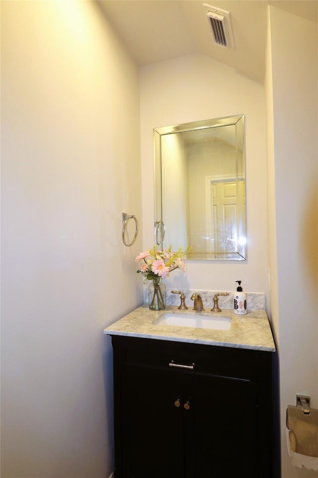 3628 Timberside Circle Dr, Houston, TX 77025 - bathroom featuring vanity and vaulted ceiling