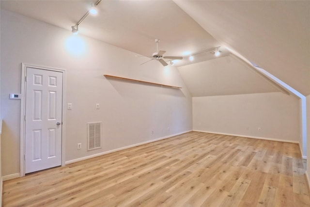 3628 Timberside Circle Dr, Houston, TX 77025 - bonus room featuring lofted ceiling, light wood-style flooring, ceiling fan, and baseboards