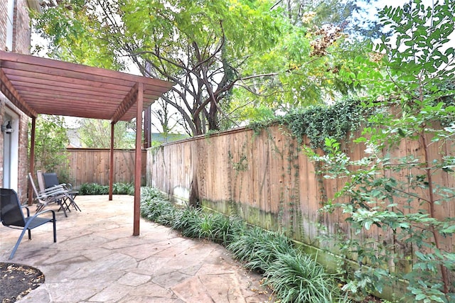 3628 Timberside Circle Dr, Houston, TX 77025 - view of patio with a fenced backyard and a pergola