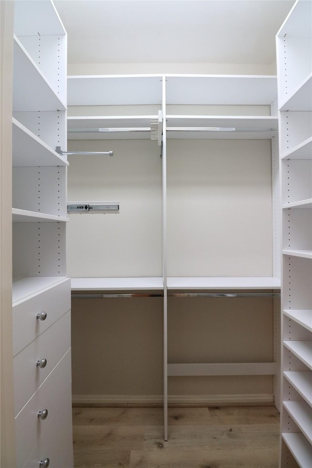 3628 Timberside Circle Dr, Houston, TX 77025 - walk in closet featuring wood finished floors