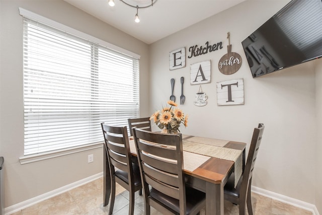 19315 S Cottonwood Green Ln, Cypress, TX 77433 - dining area with baseboards and light tile patterned floors