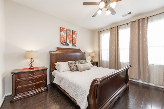 19315 S Cottonwood Green Ln, Cypress, TX 77433 - bedroom featuring dark wood finished floors, a ceiling fan, and baseboards