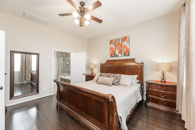 19315 S Cottonwood Green Ln, Cypress, TX 77433 - bedroom with dark wood finished floors, ensuite bath, ceiling fan, and baseboards