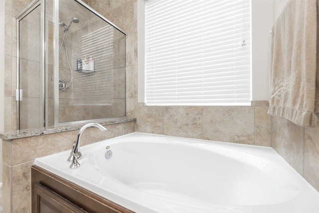 19315 S Cottonwood Green Ln, Cypress, TX 77433 - bathroom featuring a garden tub and tiled shower