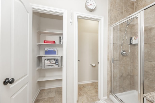 19315 S Cottonwood Green Ln, Cypress, TX 77433 - full bathroom with a shower stall, tile patterned floors, and baseboards