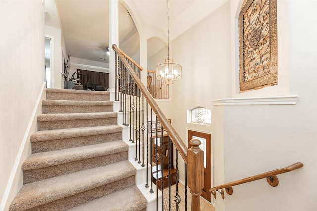 19315 S Cottonwood Green Ln, Cypress, TX 77433 - stairs with a chandelier, baseboards, and a towering ceiling