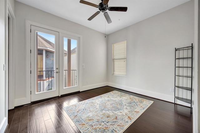 2010 Sabine St, Houston, TX 77007 - empty room with ceiling fan, dark wood-style floors, and baseboards