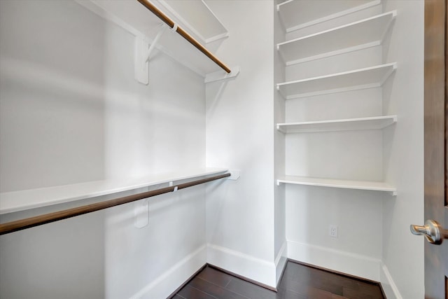 2010 Sabine St, Houston, TX 77007 - walk in closet featuring dark wood-type flooring