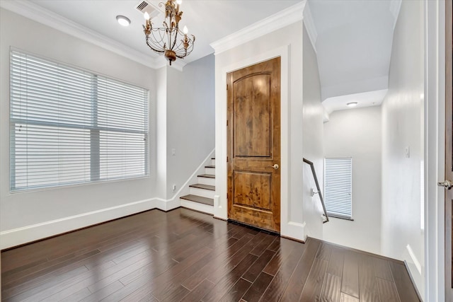 2010 Sabine St, Houston, TX 77007 - foyer entrance with crown molding, a chandelier, stairway, dark wood-style floors, and baseboards