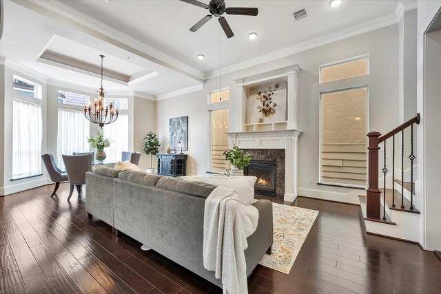 2010 Sabine St, Houston, TX 77007 - living area with a chandelier, ceiling fan, dark wood finished floors, a high end fireplace, and crown molding
