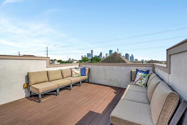 2010 Sabine St, Houston, TX 77007 - wooden terrace featuring outdoor lounge area and a view of city