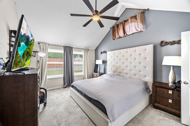 bedroom with carpet flooring, lofted ceiling, baseboards, and ceiling fan