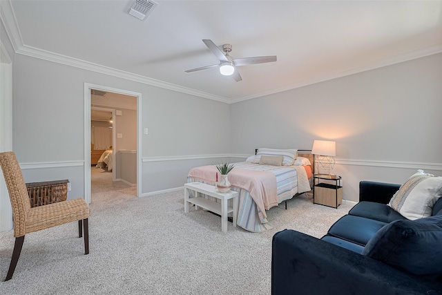 carpeted bedroom featuring ornamental molding, a ceiling fan, and baseboards