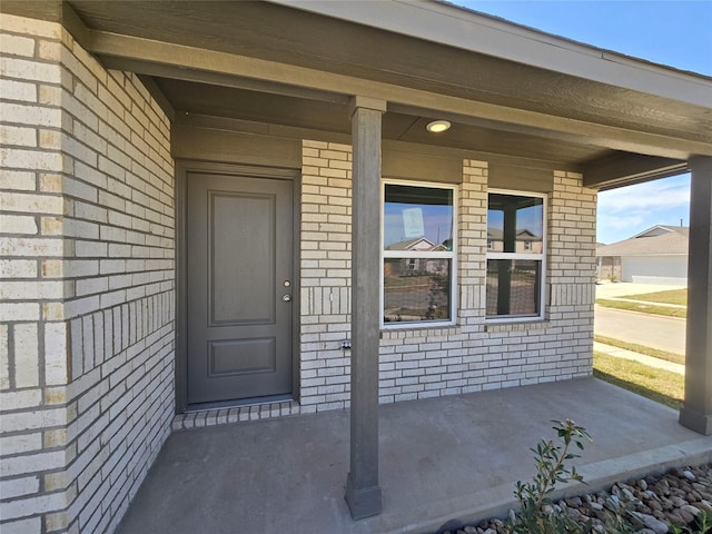 444 Shoreview Dr, Conroe, TX 77303 - entrance to property featuring covered porch and brick siding
