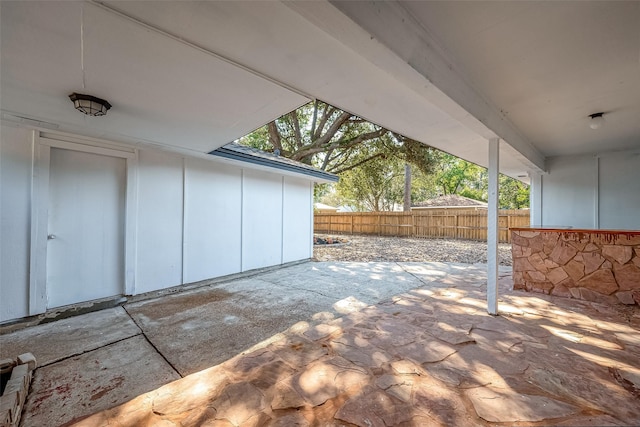 view of patio / terrace featuring fence