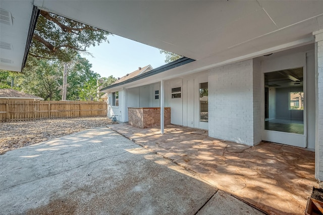 view of patio with fence