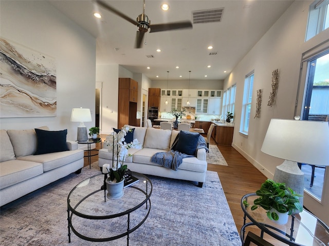 3308 Cardinal Crest Ln, Houston, TX 77080 - living area featuring wood finished floors, a ceiling fan, recessed lighting, and baseboards