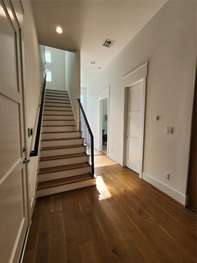 3308 Cardinal Crest Ln, Houston, TX 77080 - stairway with hardwood / wood-style flooring, baseboards, and recessed lighting