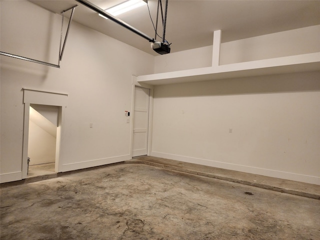 3308 Cardinal Crest Ln, Houston, TX 77080 - garage featuring a garage door opener and baseboards