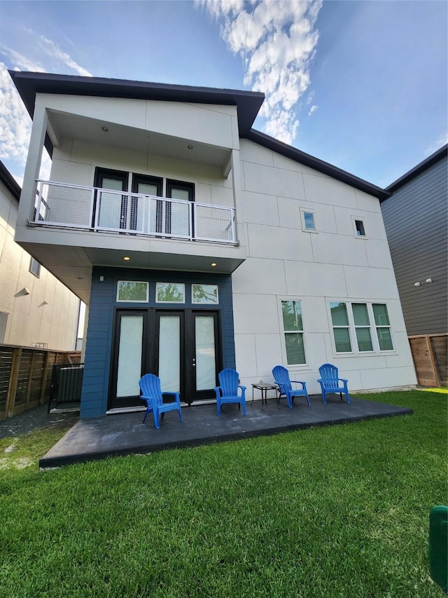 3308 Cardinal Crest Ln, Houston, TX 77080 - back of property featuring a balcony, a patio area, and central air condition unit
